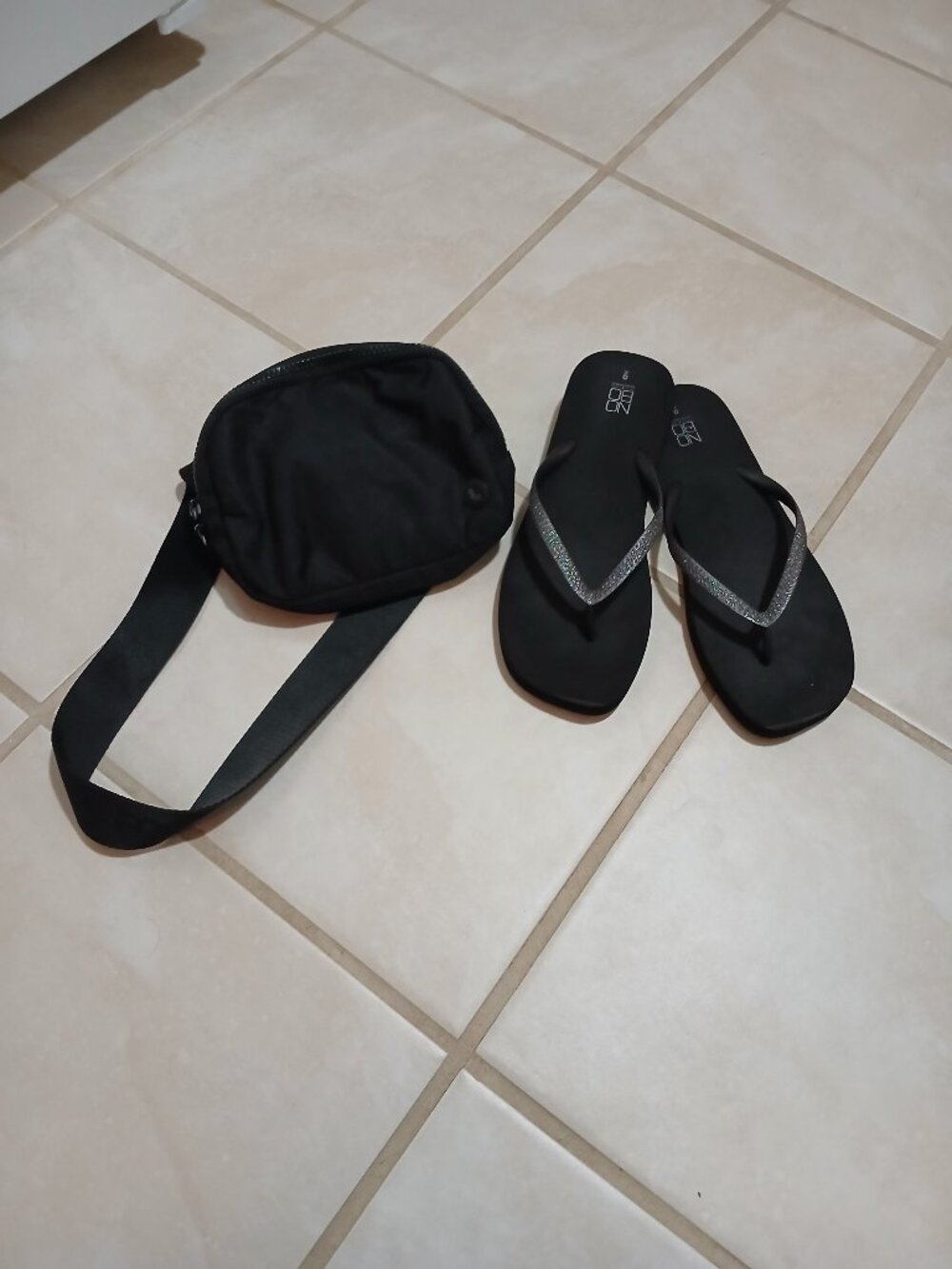 Black Flip Flops and a Black Fanny Pack Purse